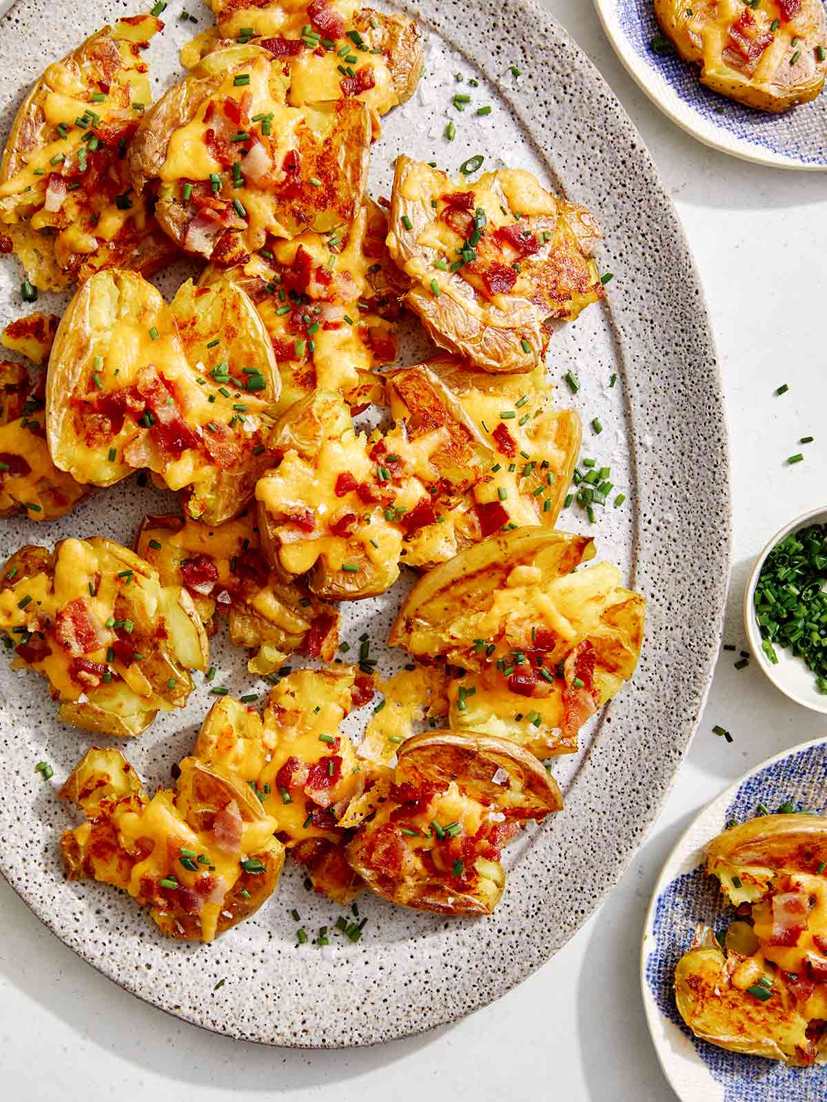 Platter on crispy smashed potatoes. 