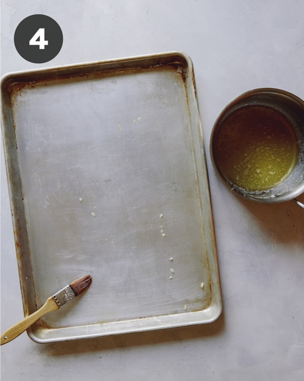 Butter a baking sheet.