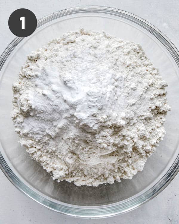 Flour in a glass bowl. 