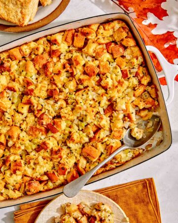 Stuffing in a baking dish with a scoop taken out.