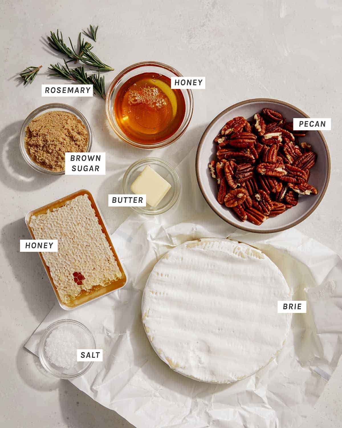 Baked brie ingredients on a kitchen counter. 