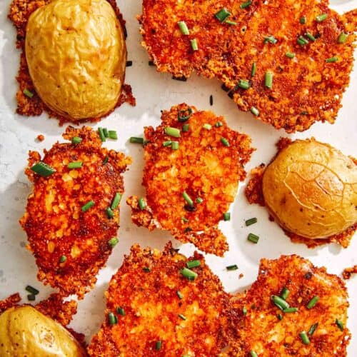 Crispy parmesan potatoes sprinkled with chives.