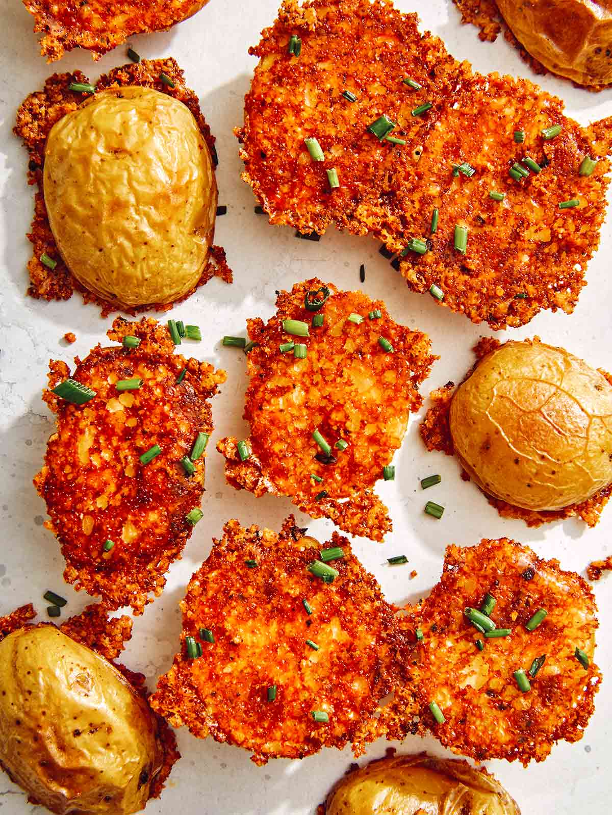 Crispy parmesan potatoes sprinkled with chives. 