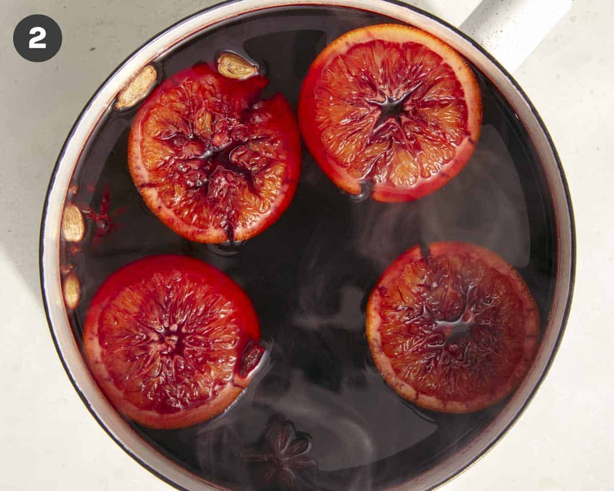 Mulled wine simmered in a pot ready to be served. 