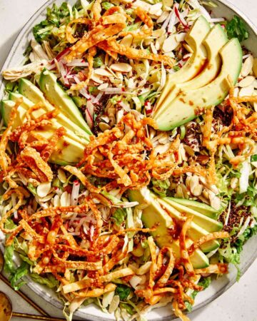 Sesame ginger chicken salad in a big bowl.