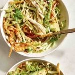 Sesame ginger chicken salad in two bowls.