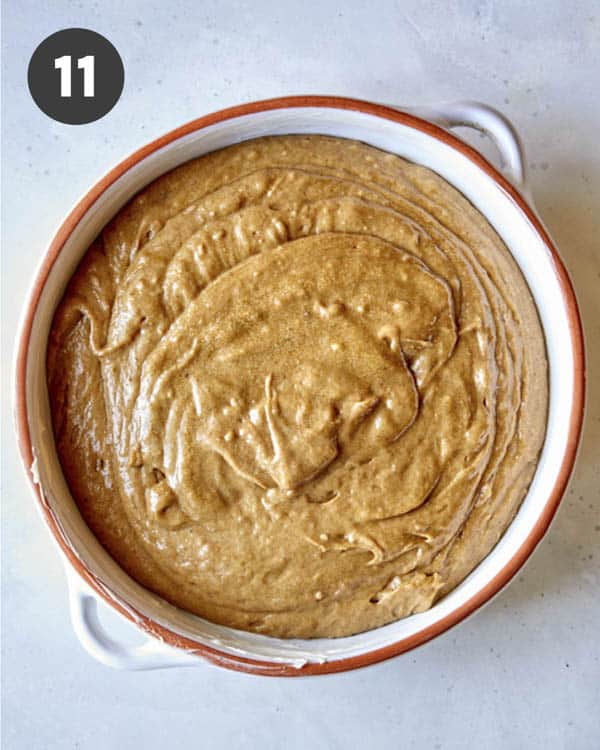 Sticky toffee pudding in a baking dish before it's baked.