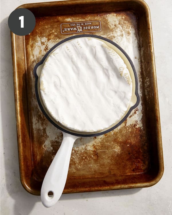 Baked brie in a skillet.