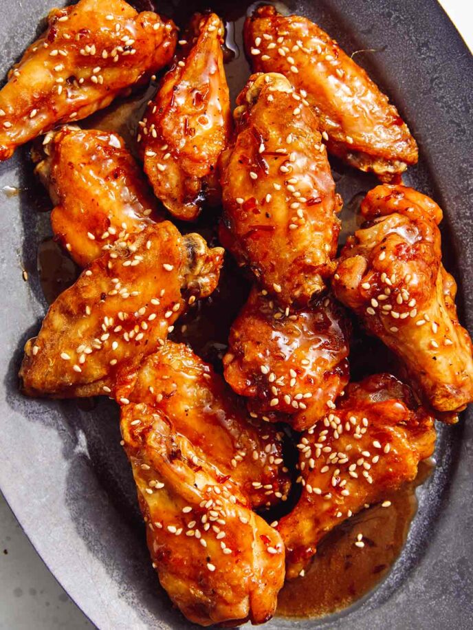 Air fryer chicken wings on a platter.