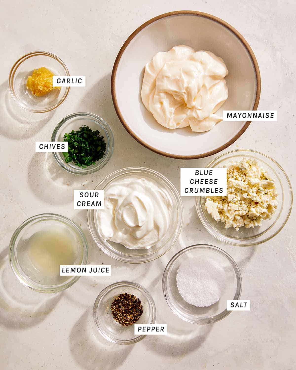 Ingredients to make a blue cheese dressing recipe. 