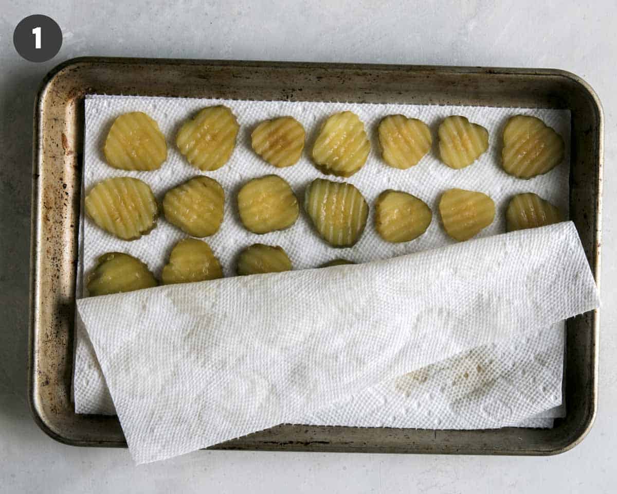 Pickle chips in a paper towel.