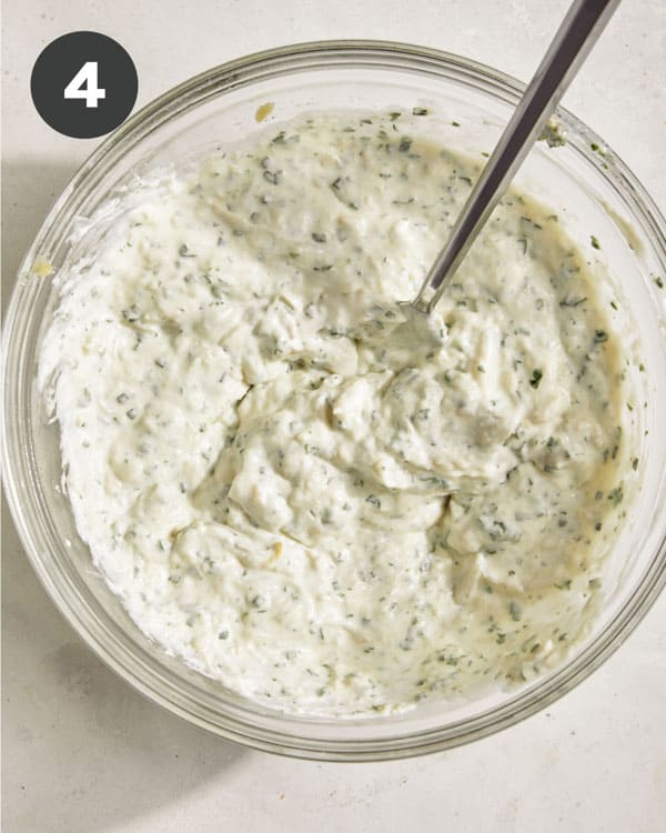 Garlic bread dip mixed together in a bowl.