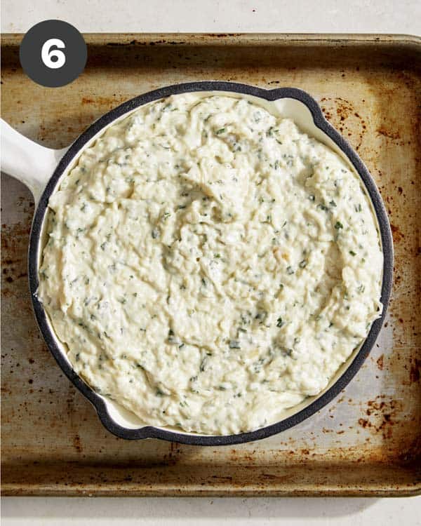 Garlic bread dip in a skillet. 