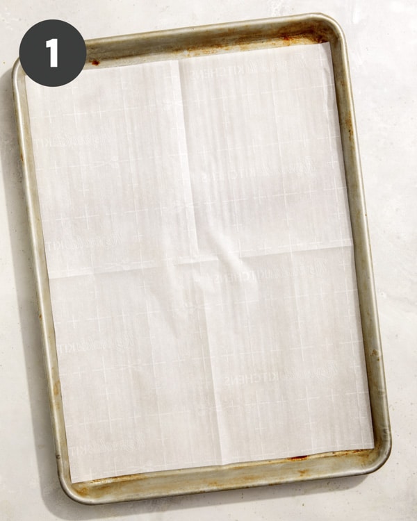 A baking sheet lined with parchment paper.