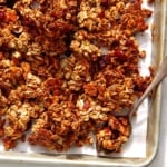 Homemade granola on a baking sheet.