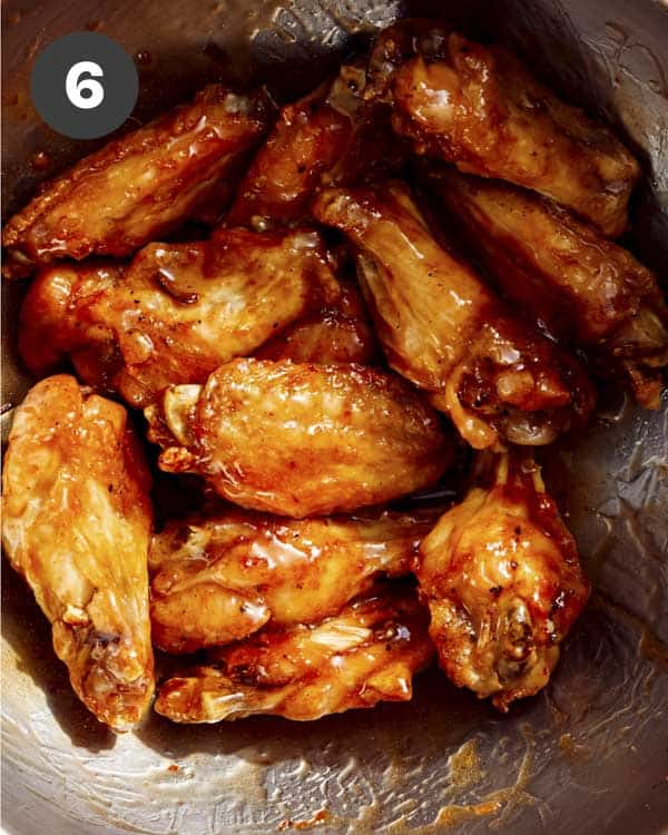 Honey butter air fryer chicken wings in a bowl.