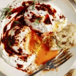 Turkish eggs with bread dipped in it.