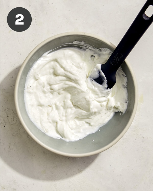 Greek yogurt mixture in a bowl for turkish eggs. 
