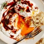 Turkish eggs with bread dipped in it.