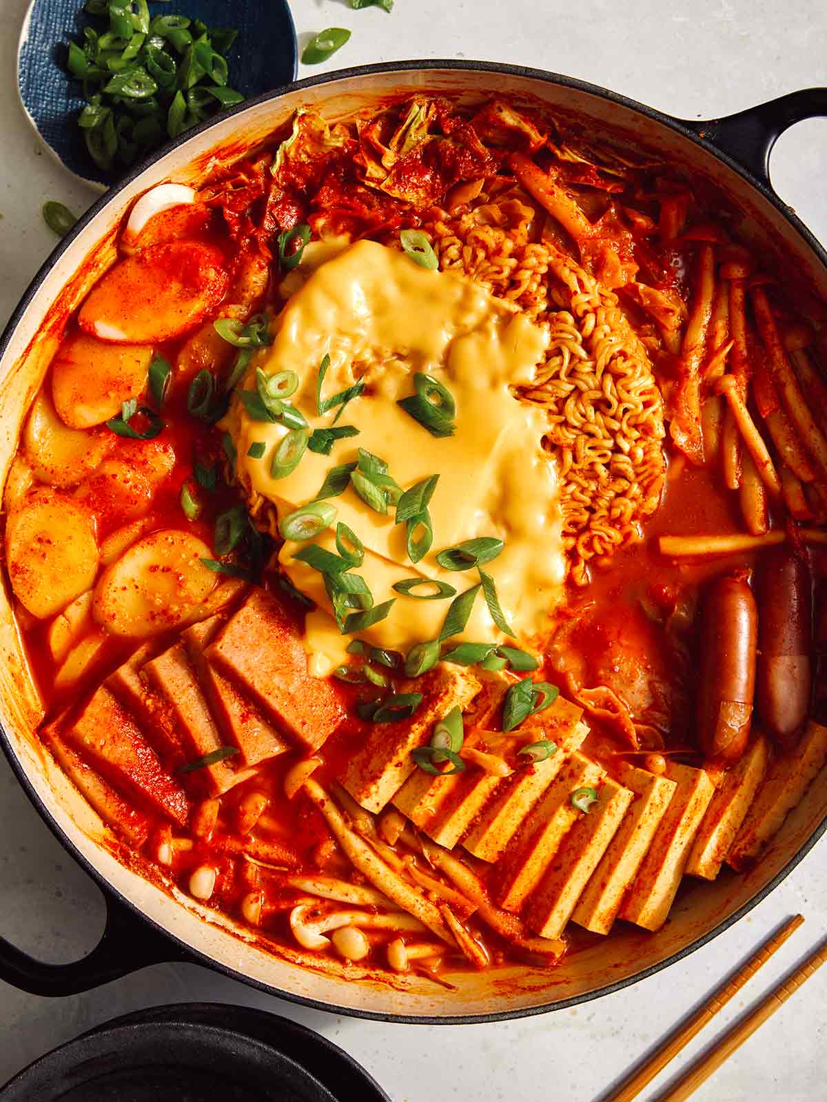 Korean Army Stew or Budae Jjigae in a pot ready to be served. 