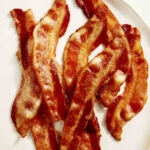 oven baked bacon on a plate