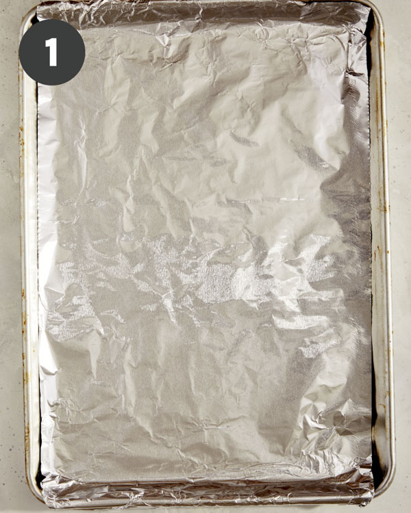 A rimmed baking sheet lined with foil. 