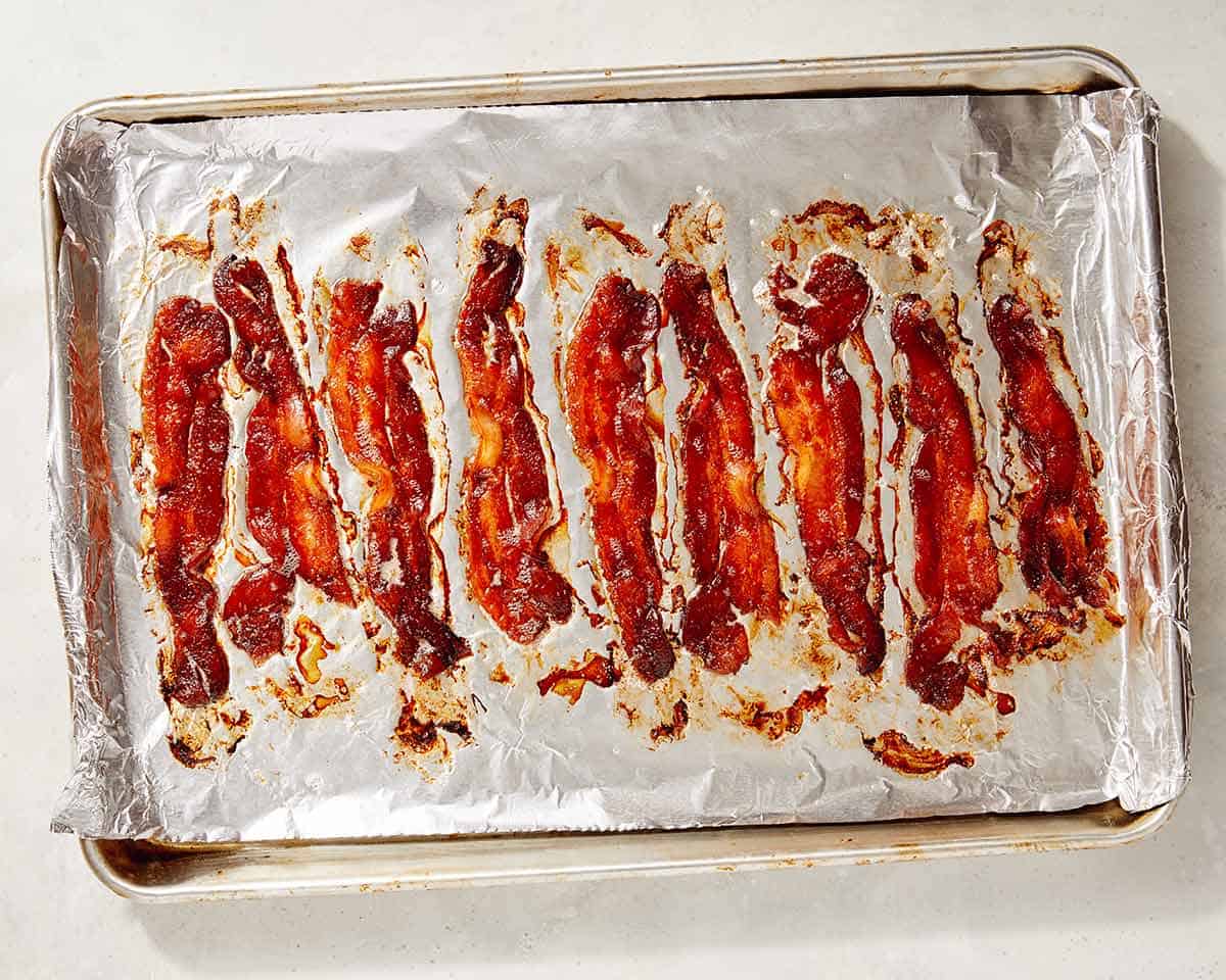 Crispy bacon on aluminum foil.