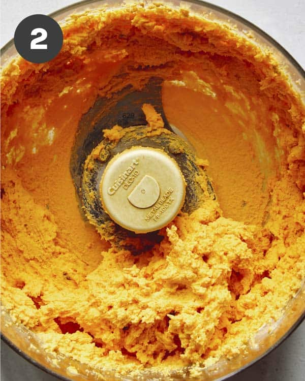 Deviled eggs filling in a food processor.