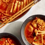 Budae Jjigae in two bowls.