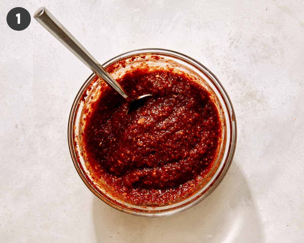 Korean army stew sauce mixed together in a bowl.