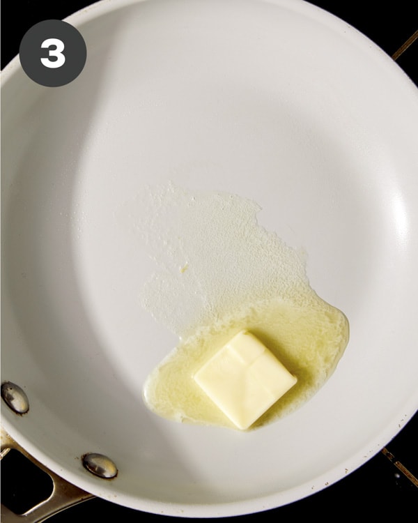 Butter melting in a skillet.