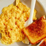 Scrambled eggs with toast.