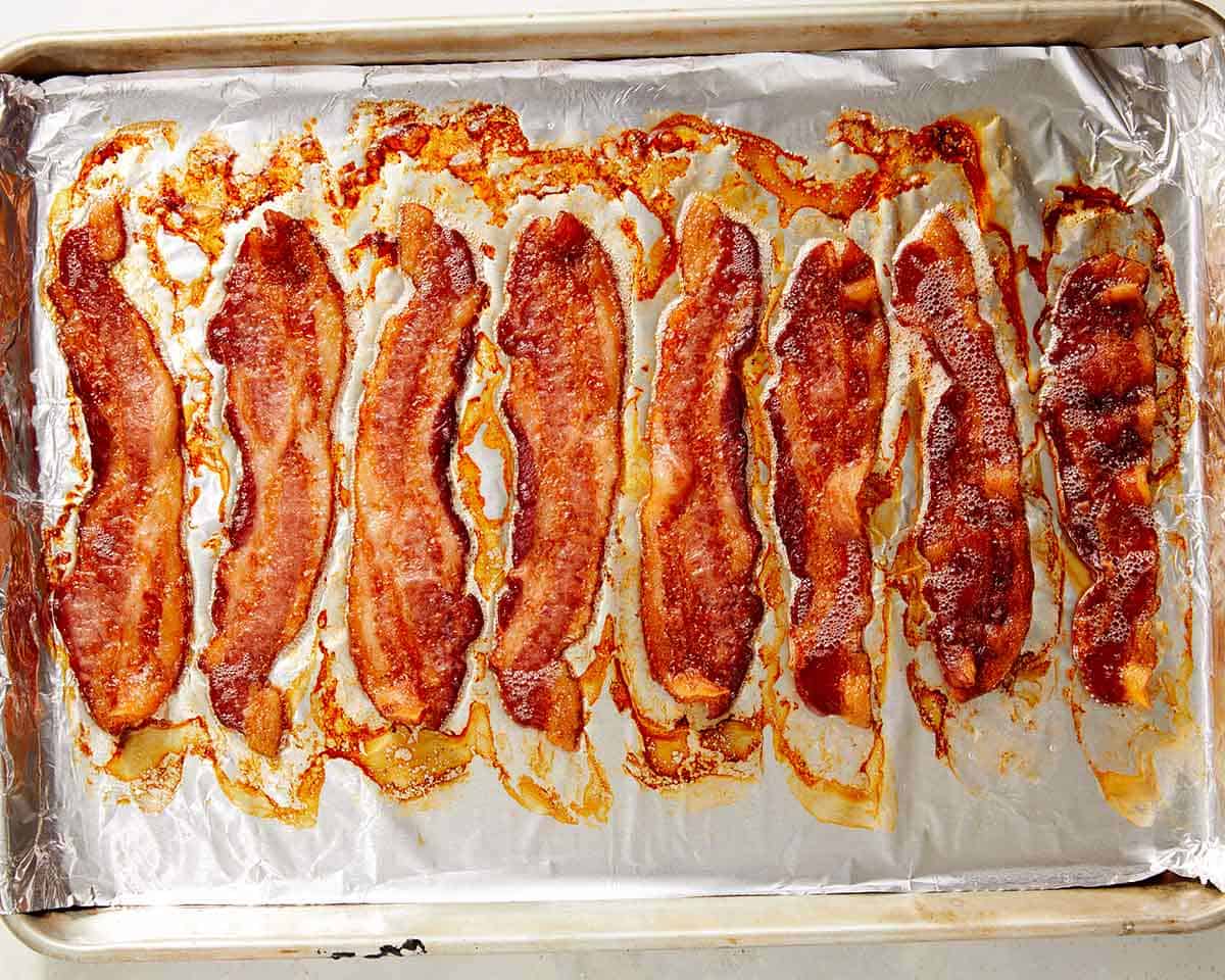 Thick cut bacon on foil cooked in the oven. 