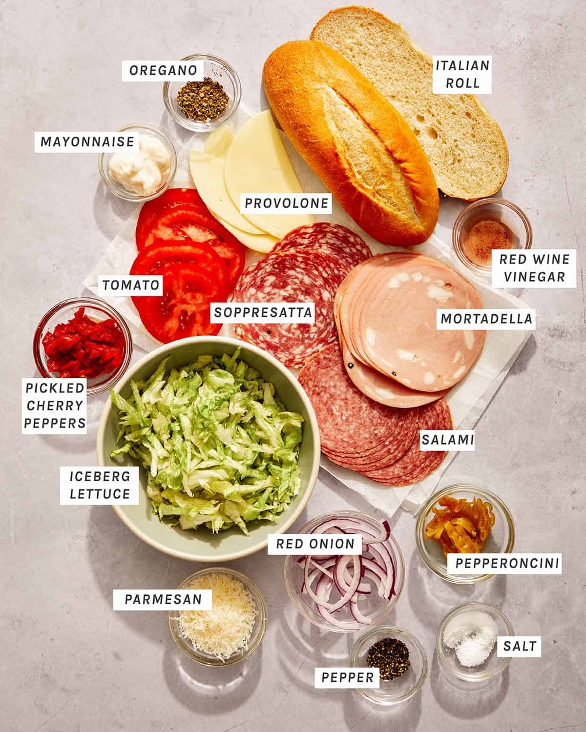 Grinder sandwich ingredients on a kitchen counter. 
