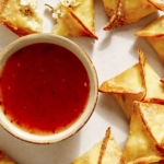 Air fryer crab rangoon on a counter.