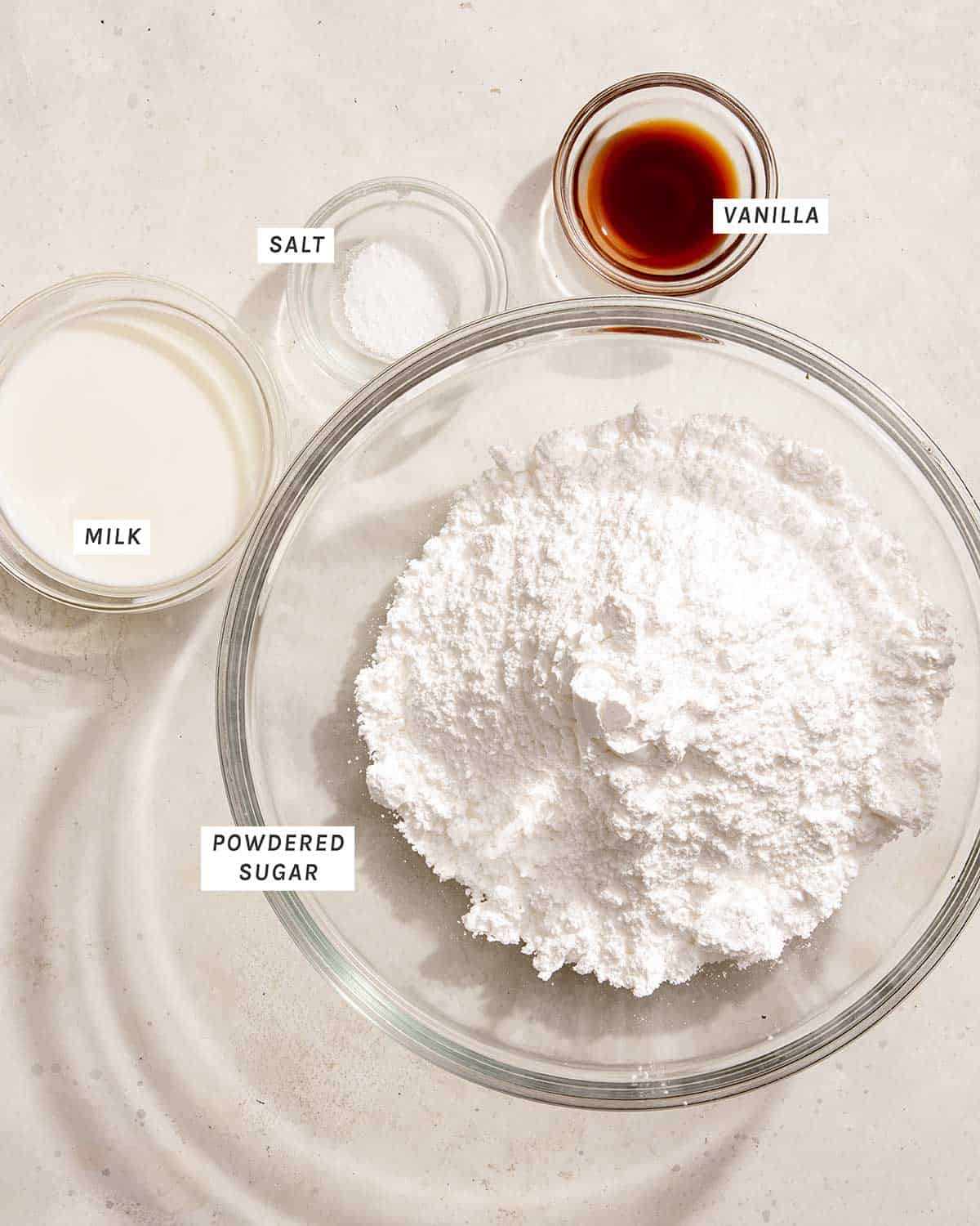 Ingredients for a vanilla glaze to go on top of bread pudding.