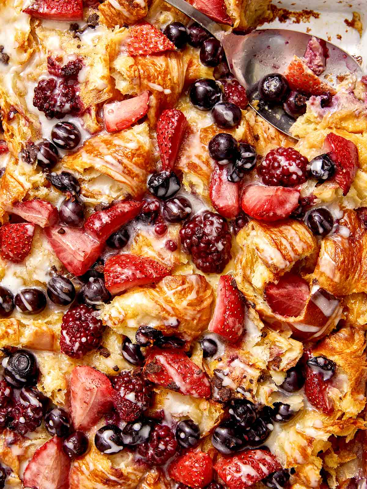 Triple berry bread pudding close up.