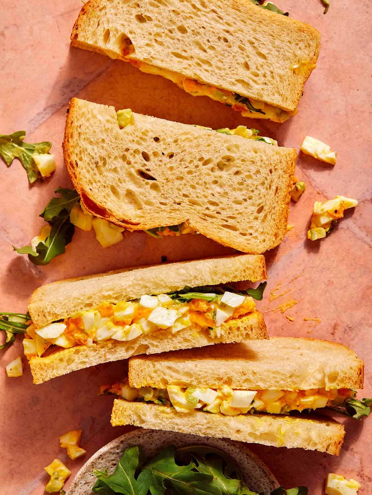 Egg salad sandwiches cut in half. 