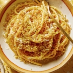 Garlic Lemon Pasta in a bowl with a fork.