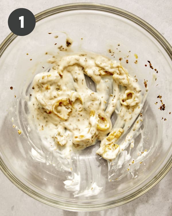 The base to make a slaw for a grinder sandwich in a bowl.
