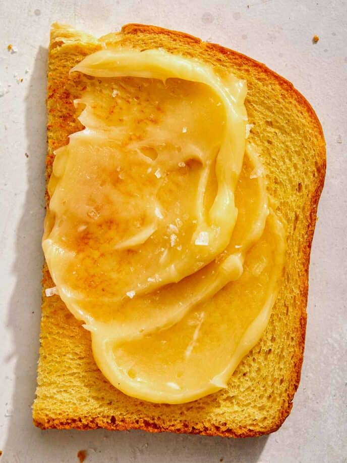 Honey butter on a piece of toast.