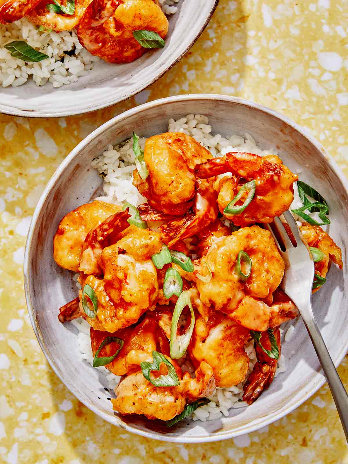 Bang bang shrimp in two bowls. 