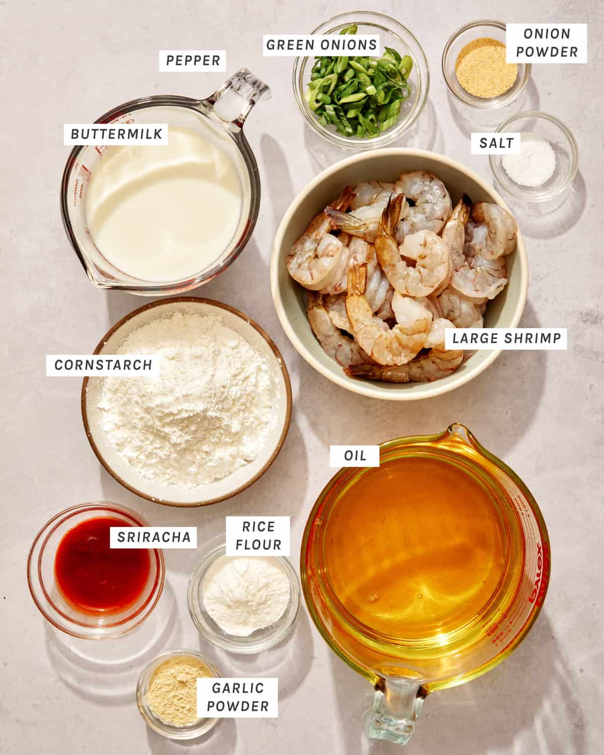 Bang bang shrimp ingredients on a kitchen counter to make a recipe. 