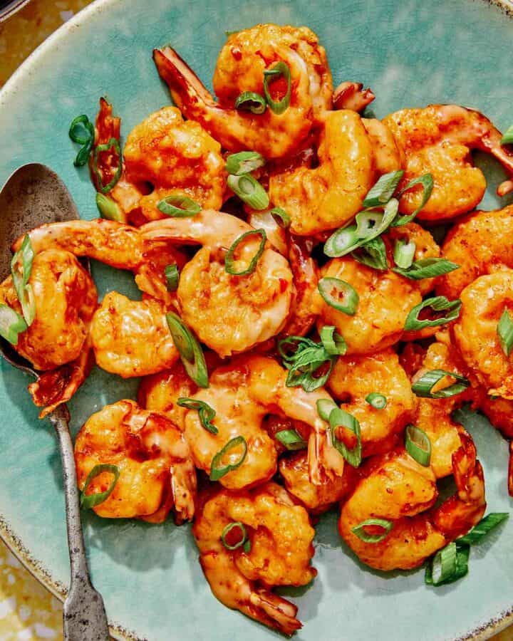 Bang bang shrimp close up on a plate.