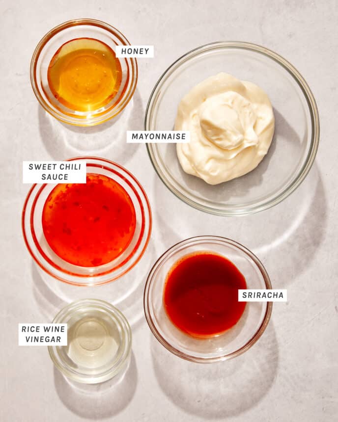 Bang bang sauce ingredients on a kitchen counter. 