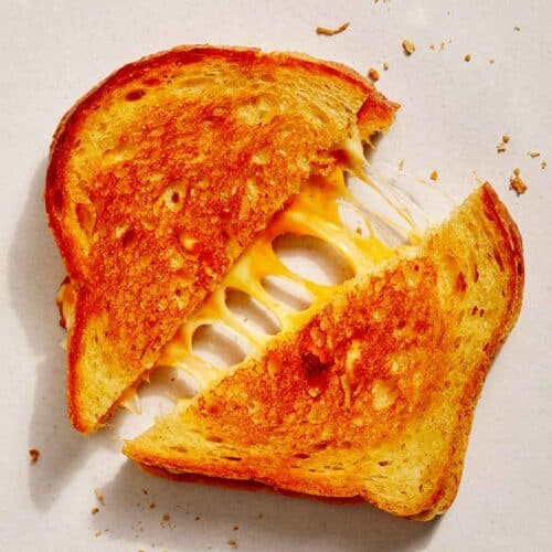 Perfect grilled cheese recipe cut in half.