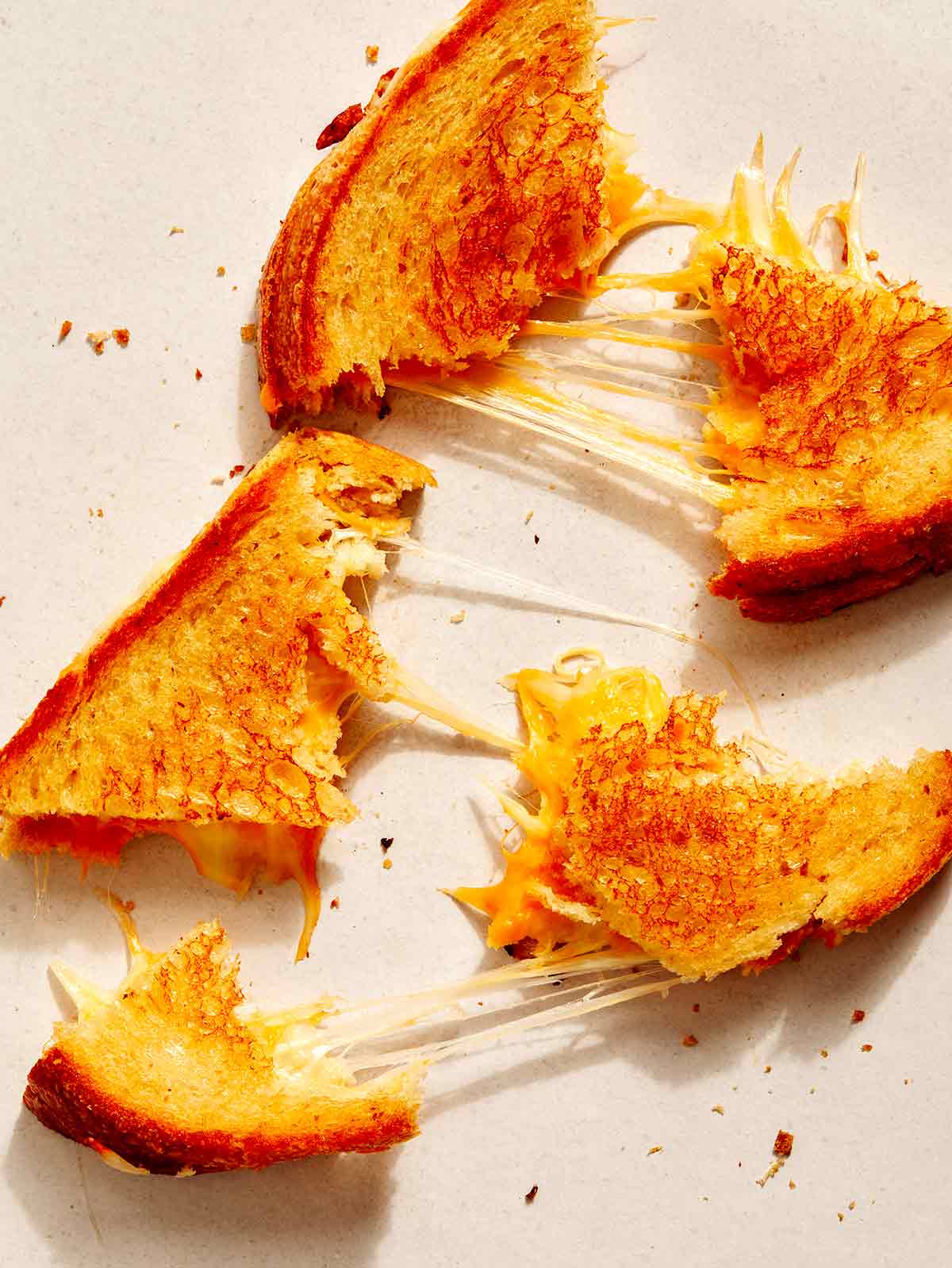 Perfect grilled cheese ripped into pieces. 