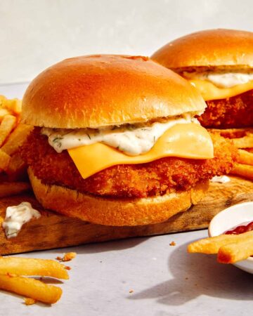 Filet o fish recipe sandwich on a board.
