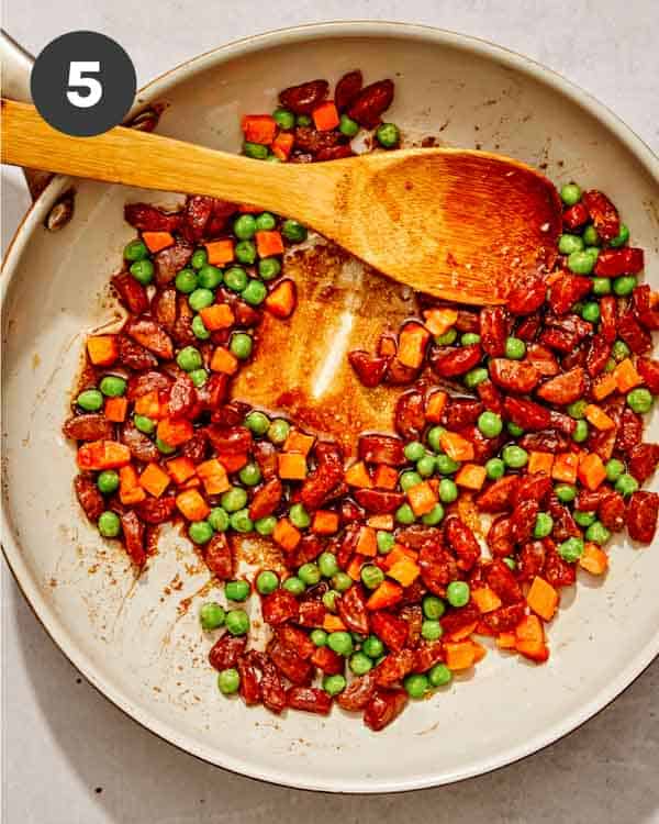 Fried rice ingredients in a skillet. 