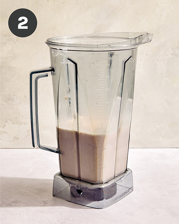 A blended up milkshake still int he blender.